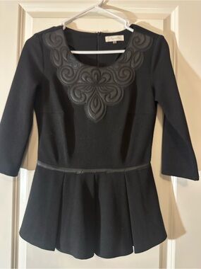 Black Peplum Top with Embossed Neck Detail